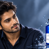 Best anti-dandruff shampoo in Bangladesh — man running his fingers through healthy hair