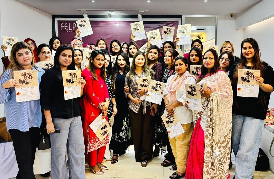 Workshop participants holding their certificates in Dhaka
